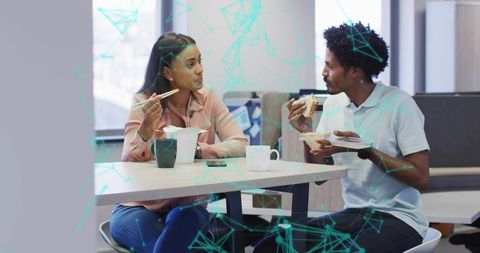 Diverse Colleagues Enjoying Lunch Break in Office Environment