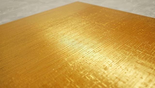 Shiny Gold Textured Panel Reflecting Modern Elegance
