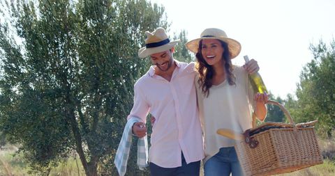 Young Couple Enjoying Outdoor Picnic Adventure