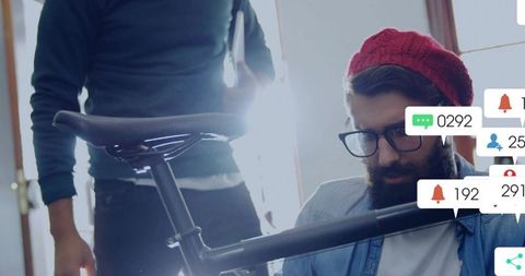 Young Bicycle Mechanic Innovating in Studio with Technology