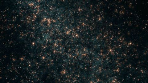 Glittering cloud of sparks illuminating night with light trails