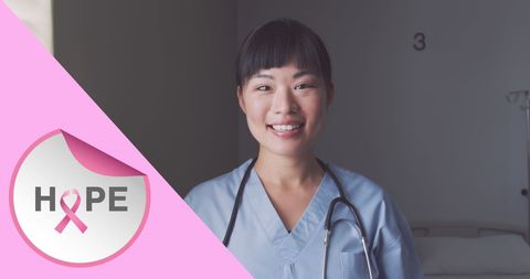 Asian Female Doctor Smiling for Breast Cancer Awareness Campaign