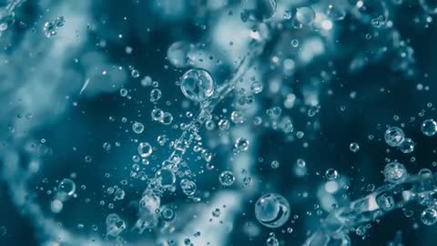 Macro View of Air Bubbles in Water Flow Created by Pump