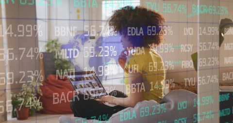 Graphic Designer Analyzing Stock Market Trends at Home