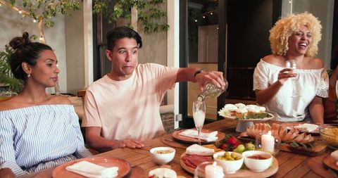 Friends Celebrating with Outdoor Dining and Fun