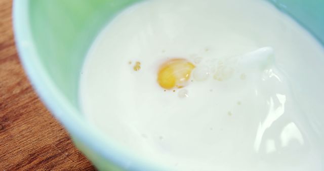 Milk with Egg Breaking into Bowl - Download Free Stock Images Pikwizard.com