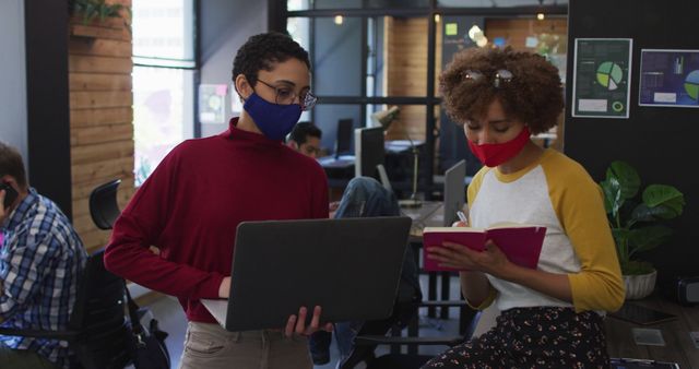 Young Colleagues Collaborating in Modern Office with Face Masks - Download Free Stock Images Pikwizard.com