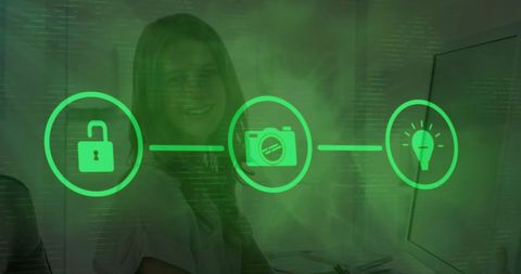 Business Technology Icons Overlaying Woman at Desk