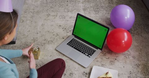 Happy birthday video call with presents, colorful balloons