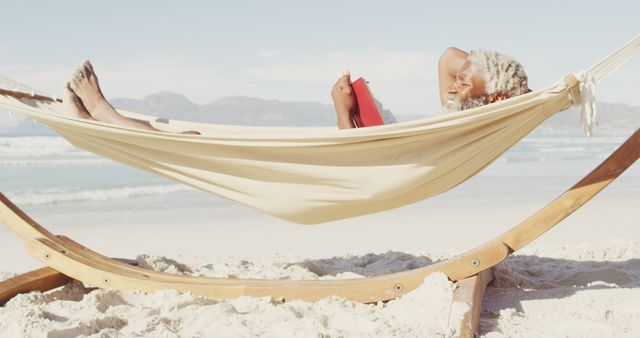 Woman Relaxing in Hammock on Beach Reading Book - Download Free Stock Images Pikwizard.com