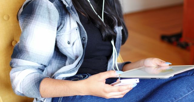 Young woman multitasking with digital tablet and smartphone - Download Free Stock Images Pikwizard.com