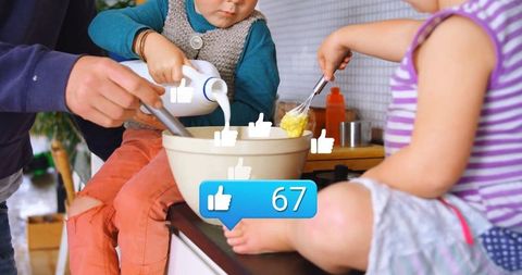 Children collaborating in home kitchen for cooking fun