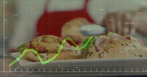 Chef Spreading Cream Cheese on Grilled Bagels with Data Overlay