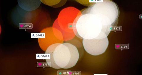 Bokeh background with social media icons floating in blurred lights