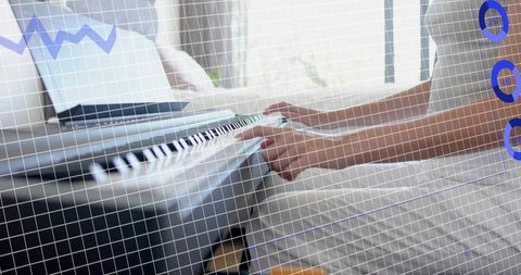 Woman playing digital piano at home by window with laptop and blue grid overlay
