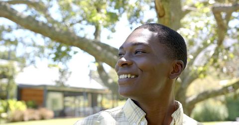 Happy Young Man Smiling Outdoors