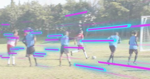 Soccer player sprinting toward goal with neon motion streaks on grassy community pitch
