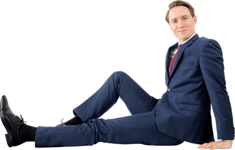 Confident Businessman in Transparent Suit Seated with Relaxed Pose