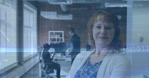 confident woman amidst digital business technology overlays - Download Free Stock Images Pikwizard.com