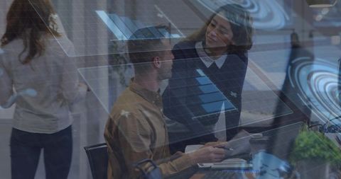 Energetic coworkers engaging in office collaboration