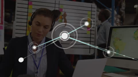 Businesswoman Using Laptop with Global Network Concept