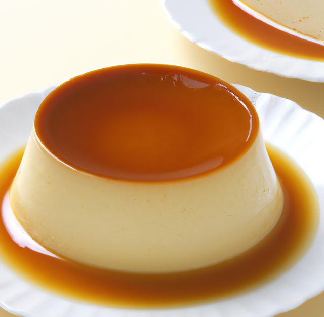 Close up of flan on white plate created using generative ai technology - Download Free Stock Photos Pikwizard.com