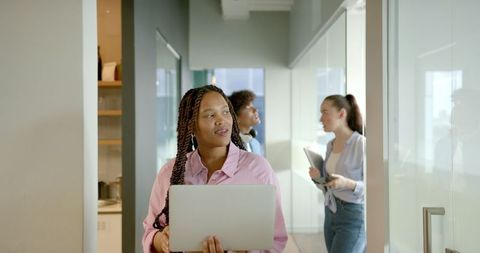 Businesswomen Walking in Office Corridor - Download Free Stock Images Pikwizard.com