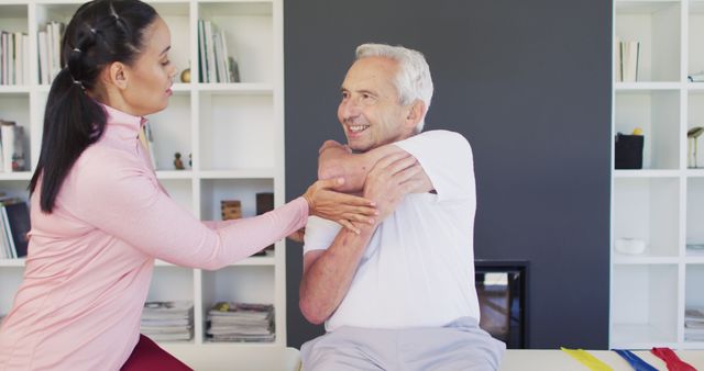 Senior Man Receiving Physical Therapy Assistance Indoors - Download Free Stock Images Pikwizard.com