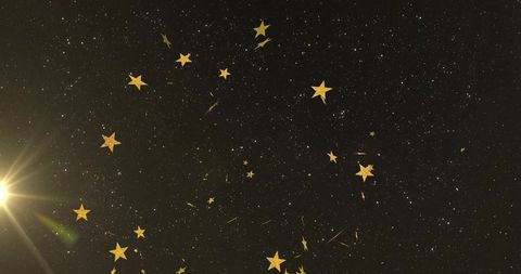 Golden Star Confetti Suspension in Dazzling Night Sky