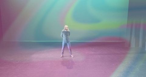 Artistic expression in motion with vibrant spotlight patterns