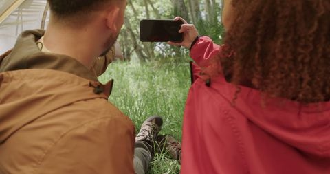Couple Taking Selfie During Relaxing Hiking Adventure in Forest