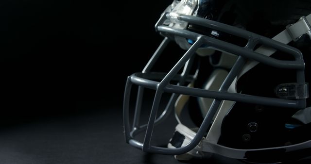 Closeup Football Helmet on Dark Background - Download Free Stock Images Pikwizard.com