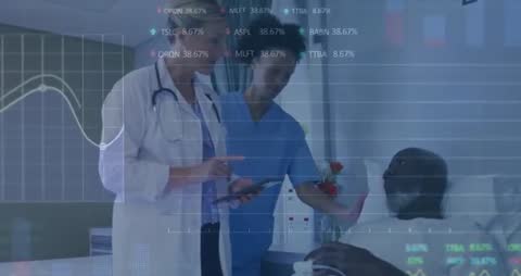 Healthcare Professionals Analyzing Data with Patient in Hospital