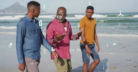 Intergenerational group walking on beach discussing carbon footprint with ar hud