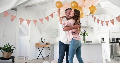Surprise home engagement with joyful celebration