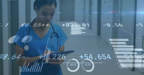 Nurse recording vitals with healthcare analytics overlay in hospital corridor