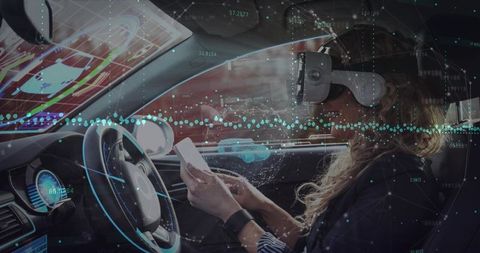 Woman using vr headset in autonomous car cabin with holographic hud and mobile control