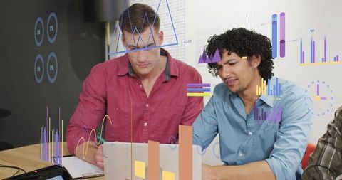 Collaborating Analysts Reviewing Data Visualizations on Laptop for Team Strategy and Growth