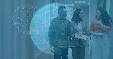 Collaborative business team discussing technology in modern workspace