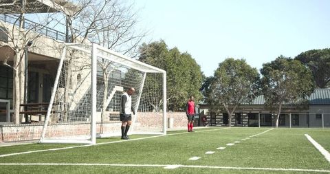 Youth Soccer Practice on Sunny School Field