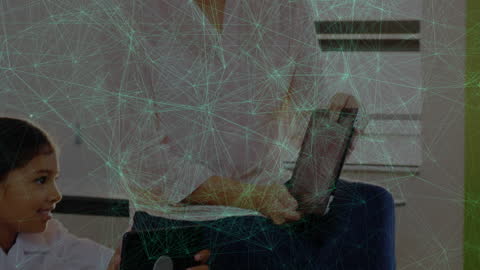 Teacher Engaging Student with Tablet and Digital Network