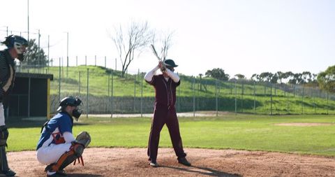 Baseball Game in Full Swing on Scenic Field