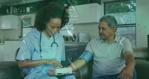 Nurse checking blood pressure on senior patient at home with dna double helix overlay