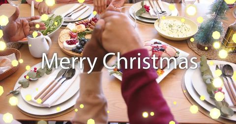 Diverse Friends Celebrating Christmas Dinner at Festive Table - Download Free Stock Images Pikwizard.com