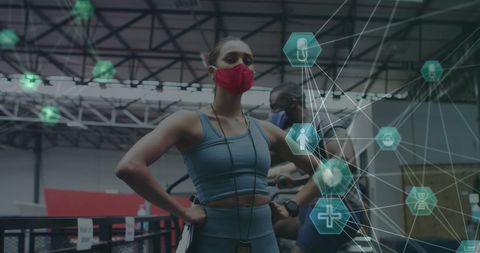Female Fitness Trainer in Gym Learning Medical Advancements Digitally - Download Free Stock Images Pikwizard.com