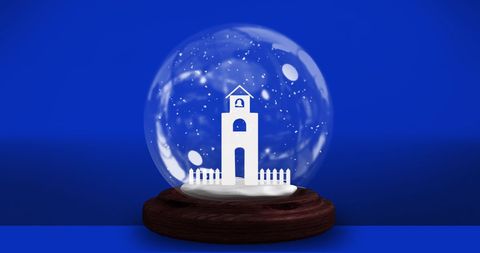 Winter festival concept: church snow globe with blue background