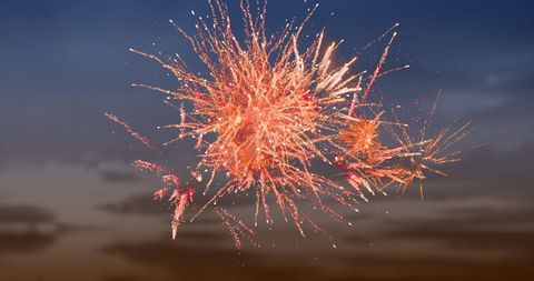 Explosive Red Fireworks Display During Dramatic Sunset Sky - Download Free Stock Images Pikwizard.com
