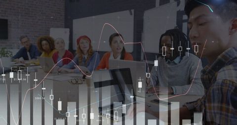 Diverse Team Analyzing Financial Data with Laptops and Charts