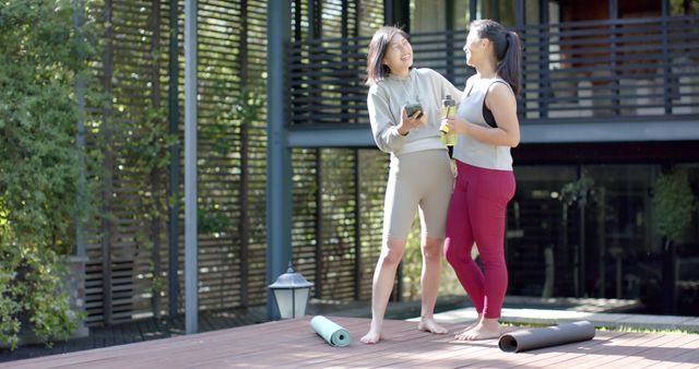 Two Women Enjoying Break After Exercising Outdoors - Download Free Stock Images Pikwizard.com