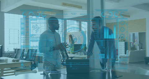 Two Colleagues Discussing Business Technology